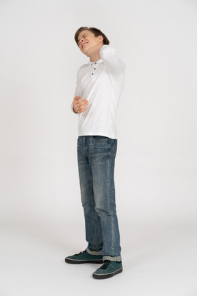 Young man in casual clothes standing