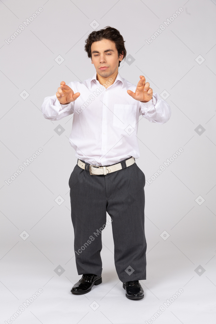 Male office worker crossing his fingers