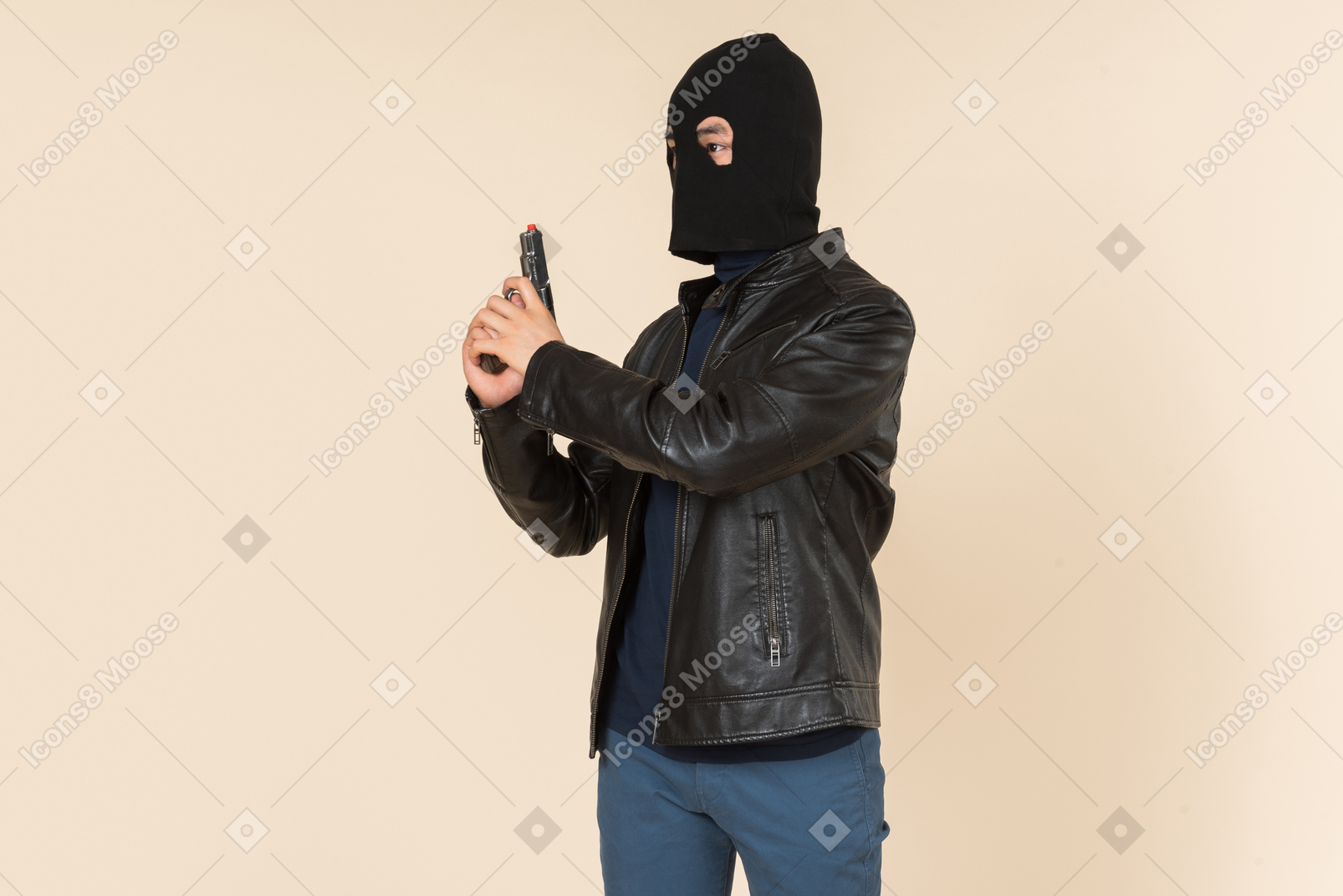 Man in balaclava holding a gun