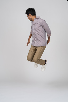 Man in casual clothes jumping