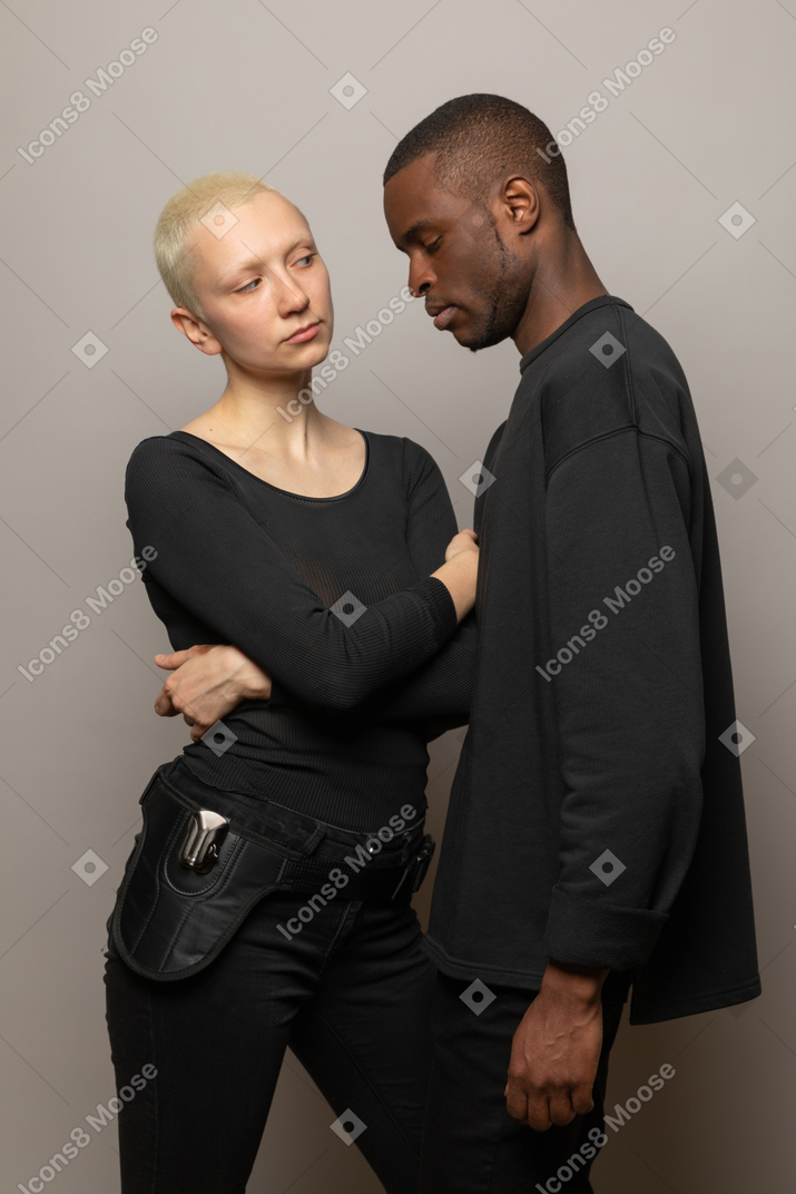 Young woman looking at man