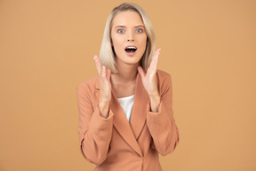 Excited young businesswoman