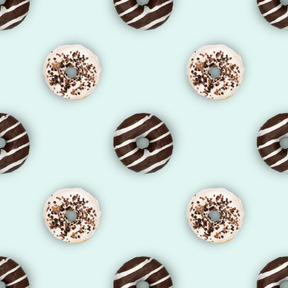 Glazed doughnuts over pink background