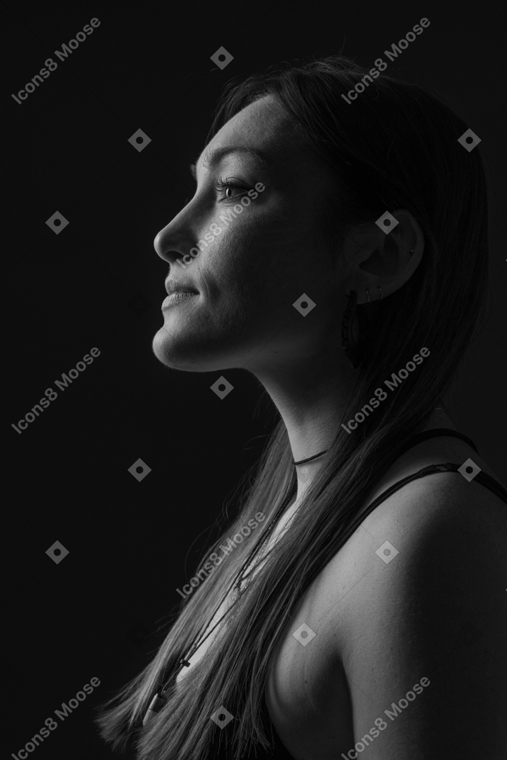 Black and white photo of profile of a woman