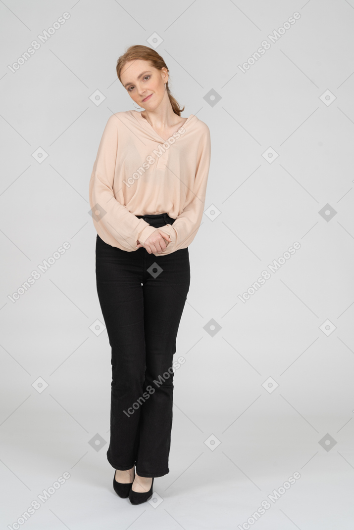 Woman in beautiful blouse standing