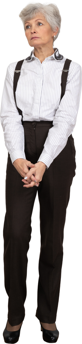 Front view of an old lady in office clothing holding hands together