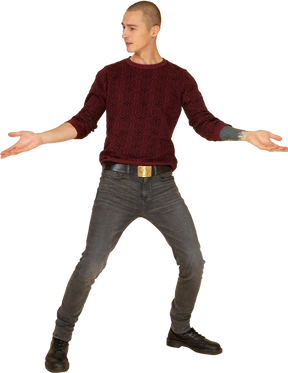 Front view of a young man in red pullover standing with his legs and arms widespread