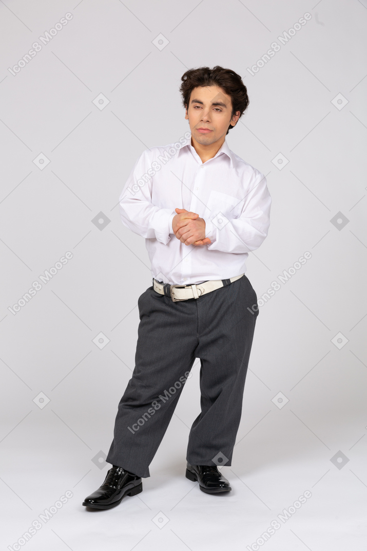 Young man with folded hands