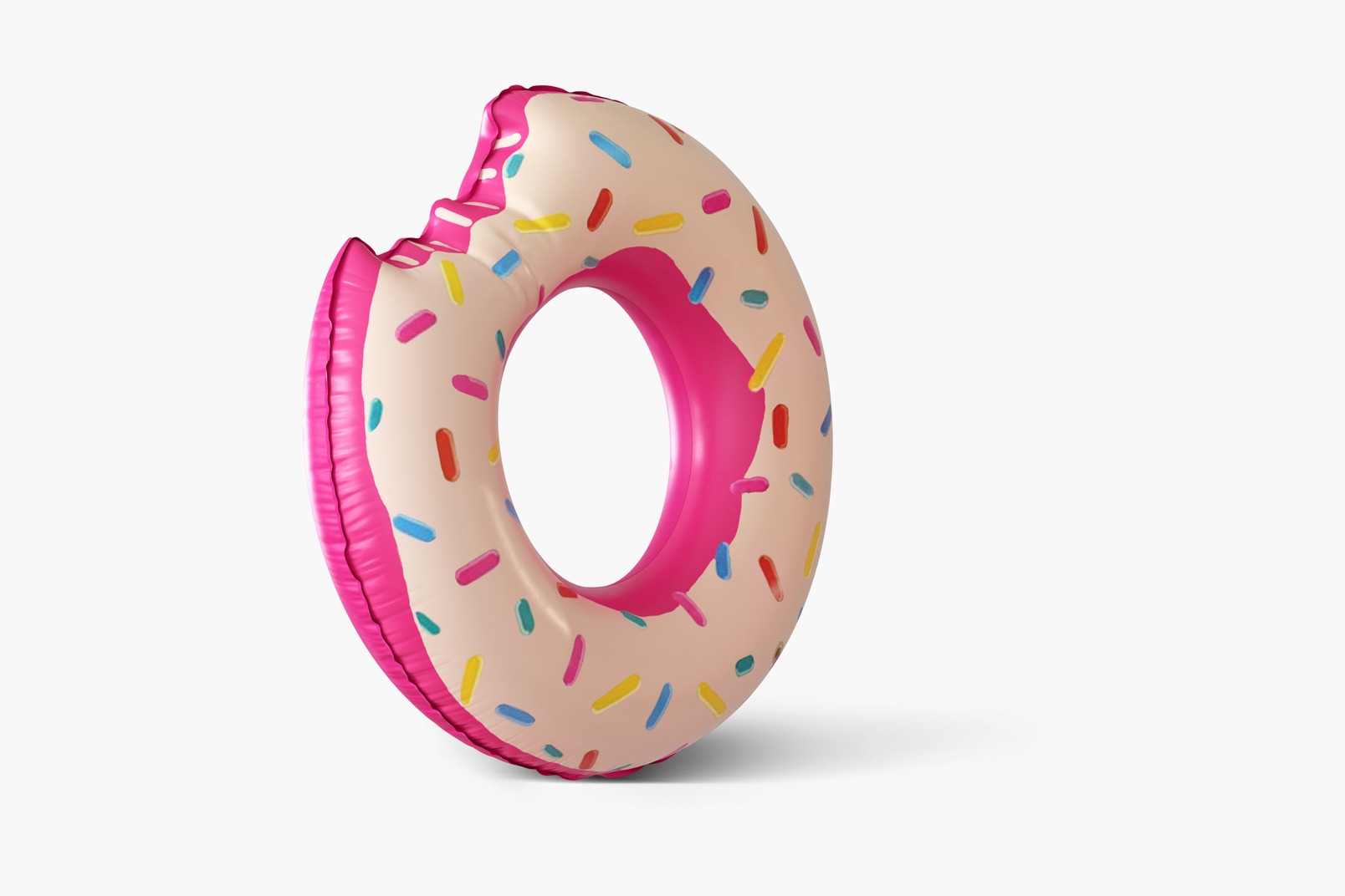 Pink and white donut rubber ring on white background
