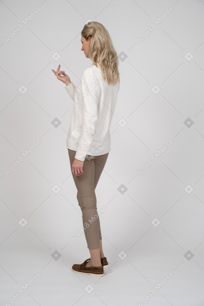 Woman in casual clothes standing