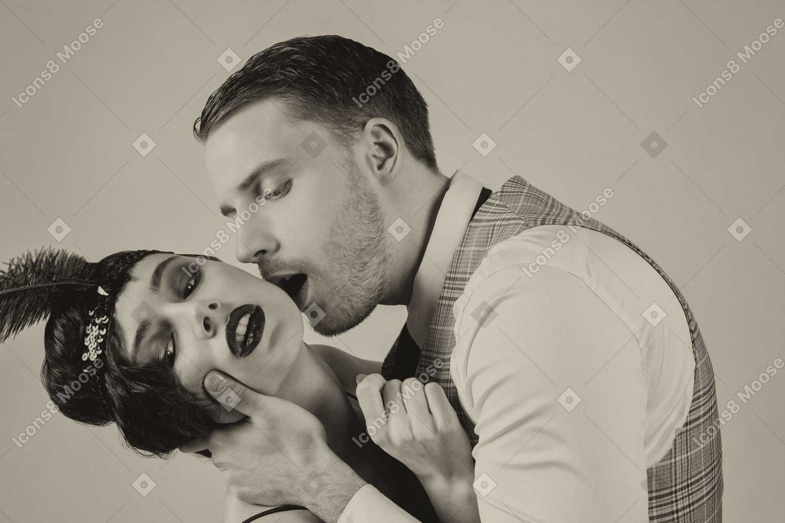 Portrait of passionate young man kissing a flapper