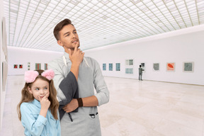 Father and daughter in the art gallery