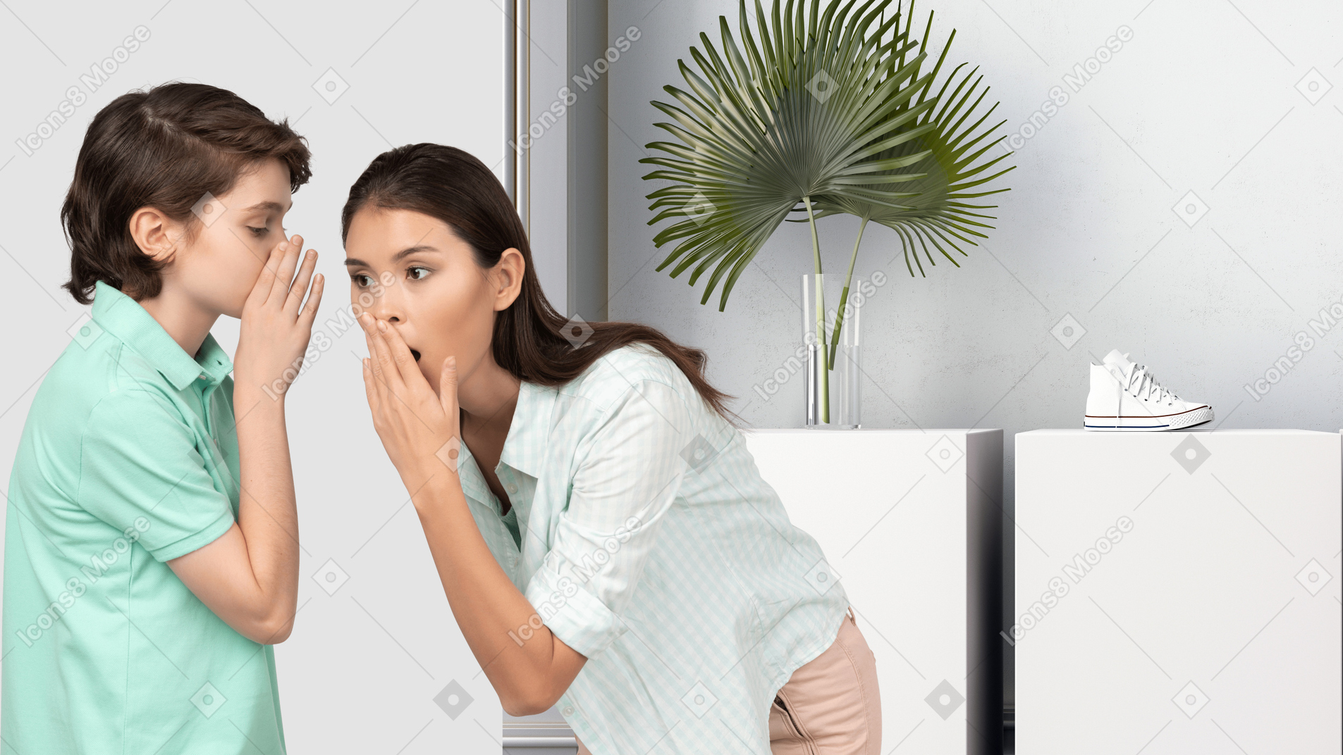 A boy whispering something to a woman