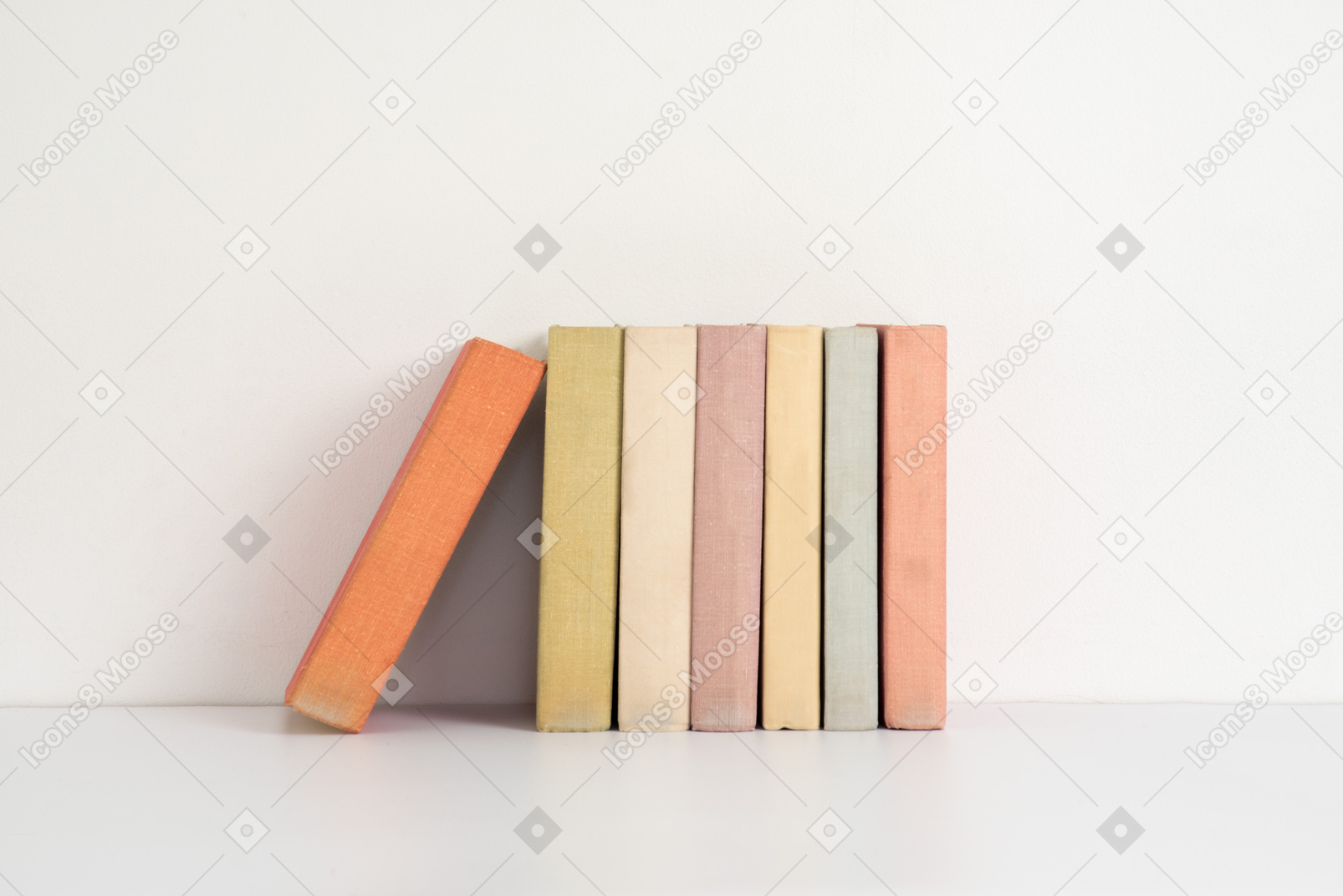 Books in a row with one book standing out