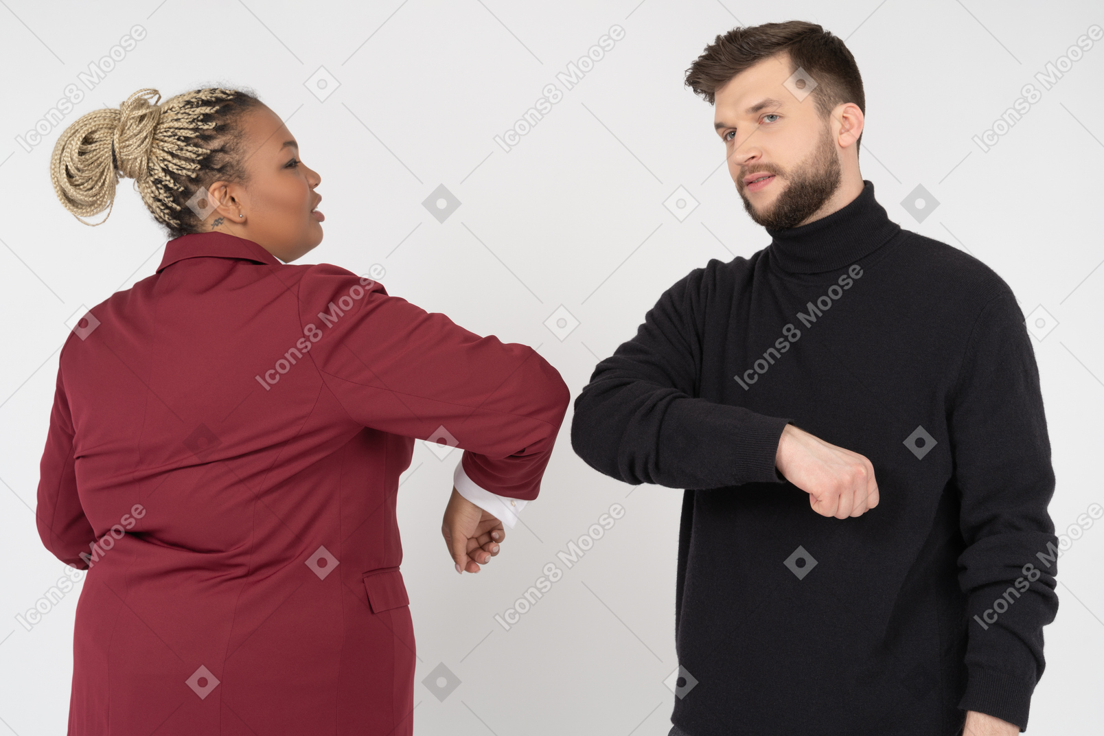 Colleagues greeting each other with elbow bump