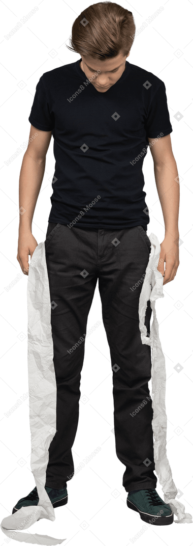 Male looking down toilet paper rolling out of his pockets