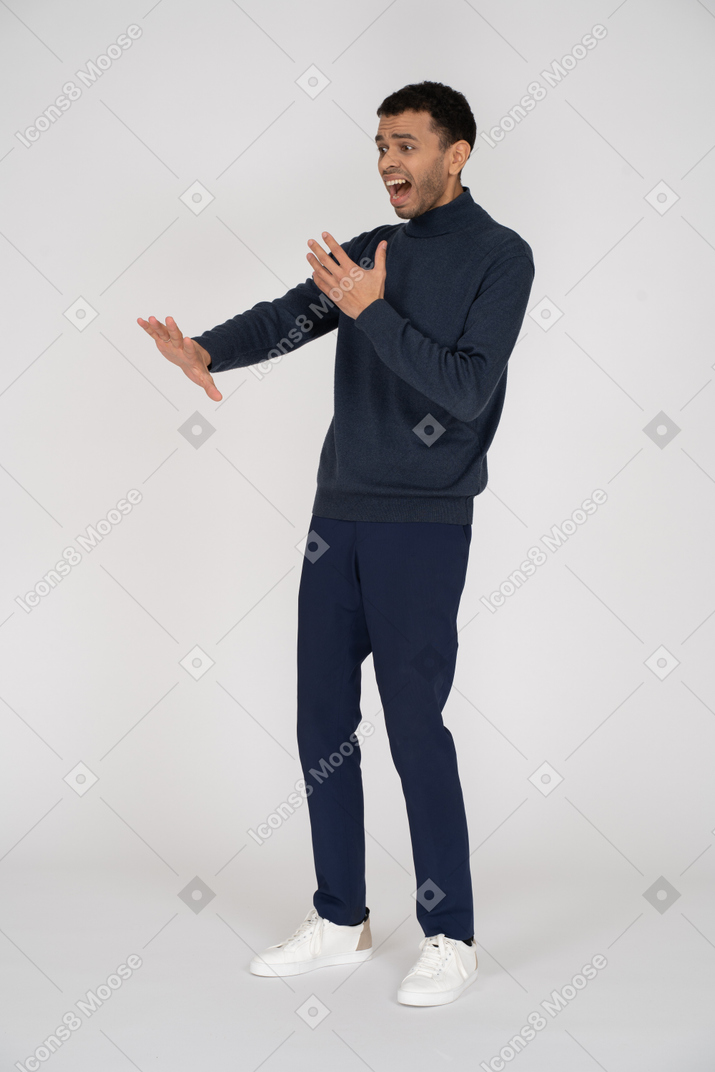 Man in black clothes posing