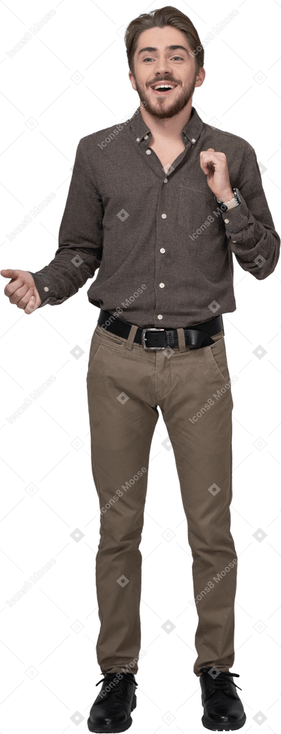 Front view of a delighted young man in office clothing