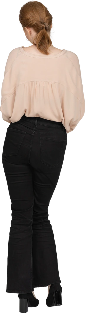Woman in beautiful blouse standing