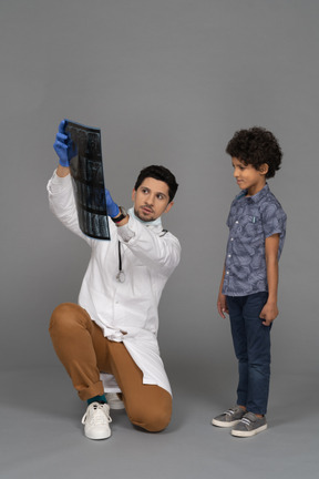 Boy looking at x-ray image