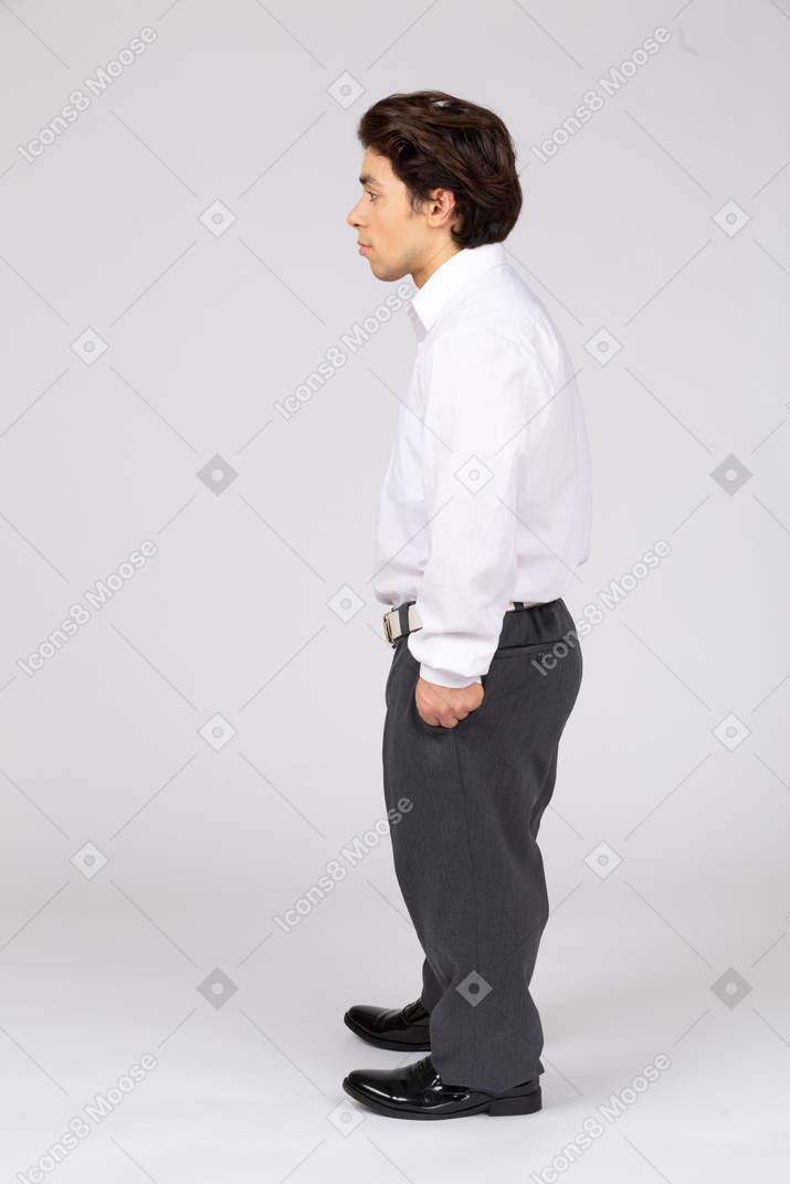 Side view of a male office worker looking away