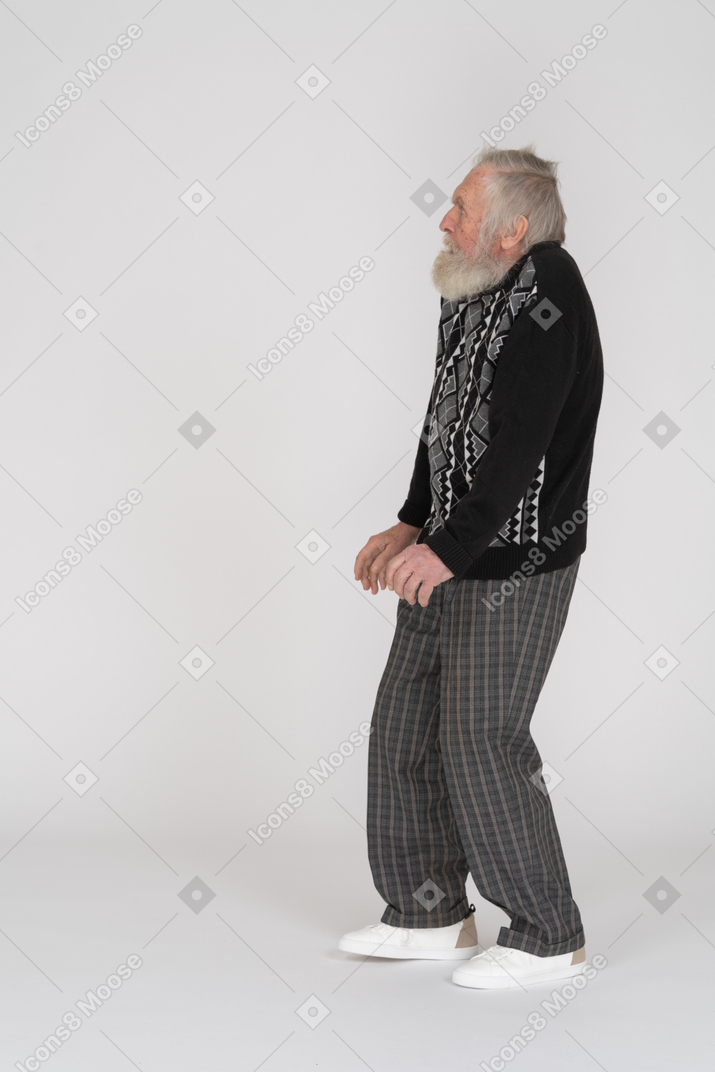 Side view of a scared old man