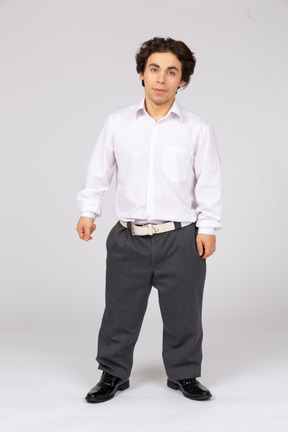 Satisfied young man in white shirt