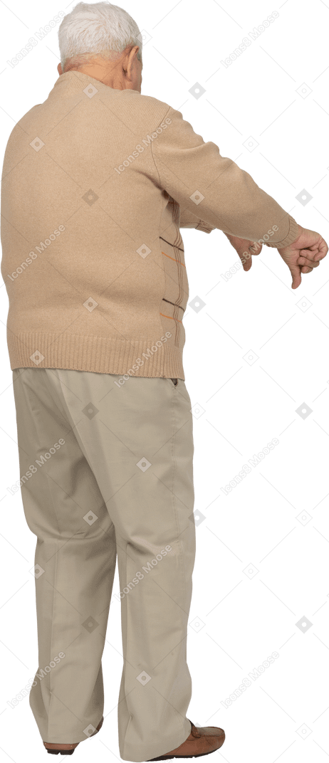 Rear view of an old man in casual clothes showing thumbs down