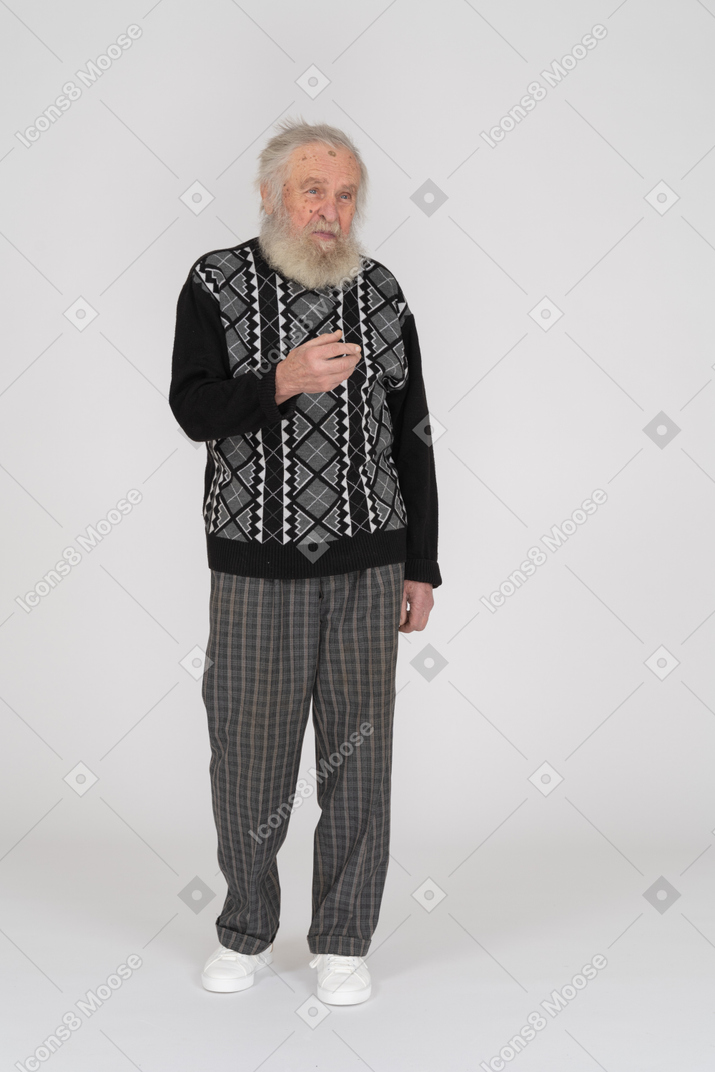 Standing elderly man offering handshake