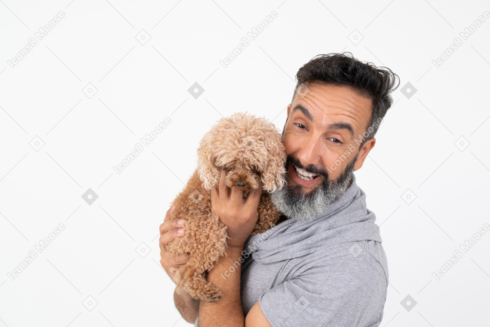 Happy  man holding a puppy