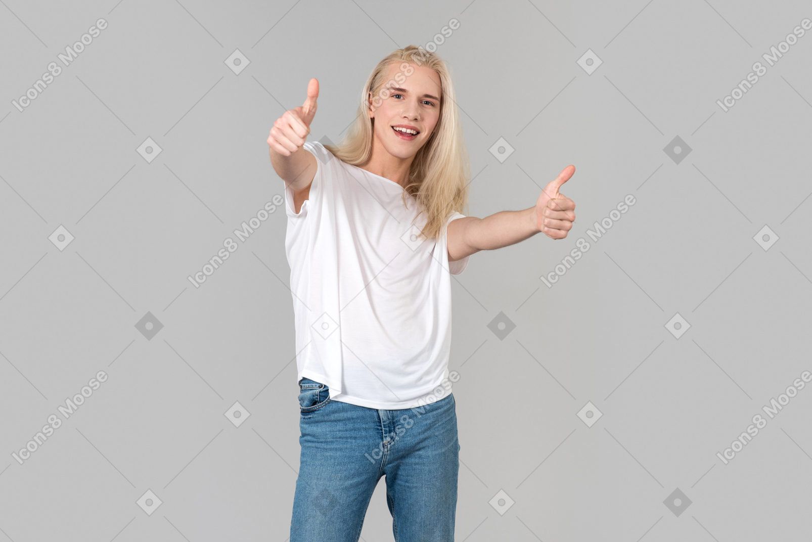 Beautiful young man showing thumbs up