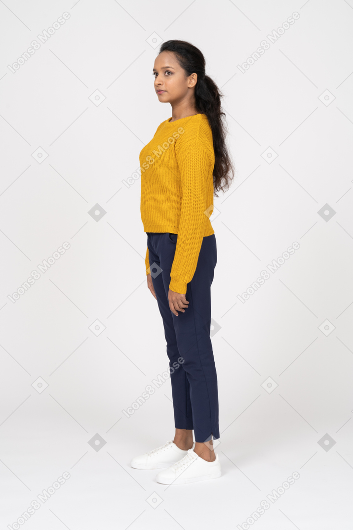 Side view of a girl in casual clothes