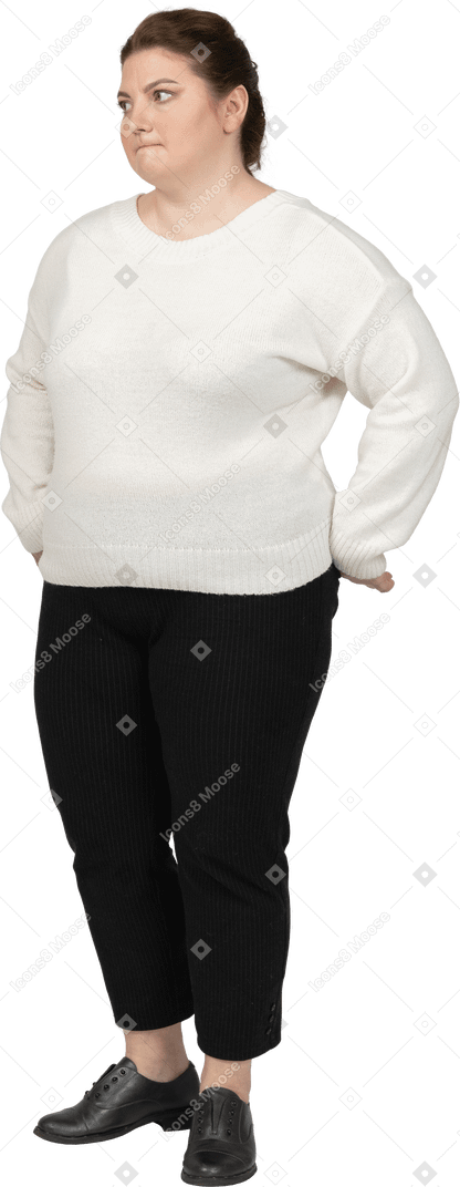 Plus size woman in casual clothes biting her lip