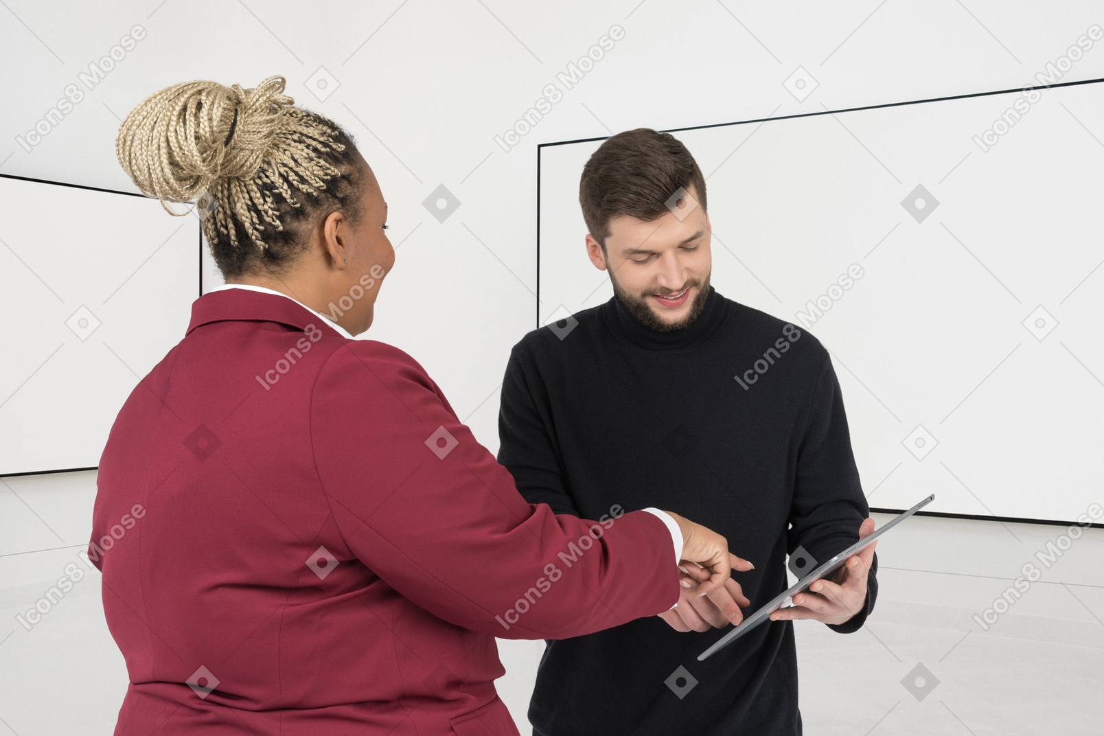 Photo of a man and woman working on a project