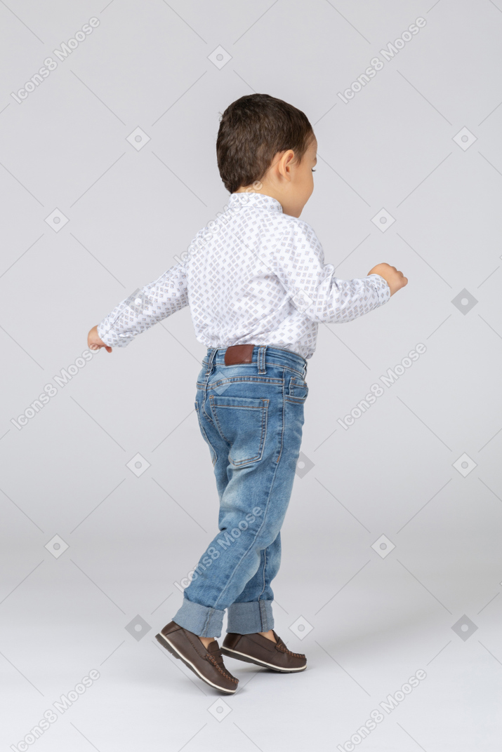 Confident kid walking away