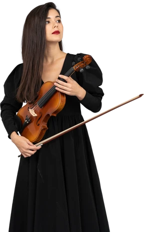 Close-up of a young lady in black dress holding the violin