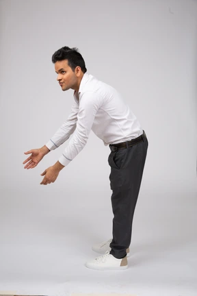 Man in white shirt standing