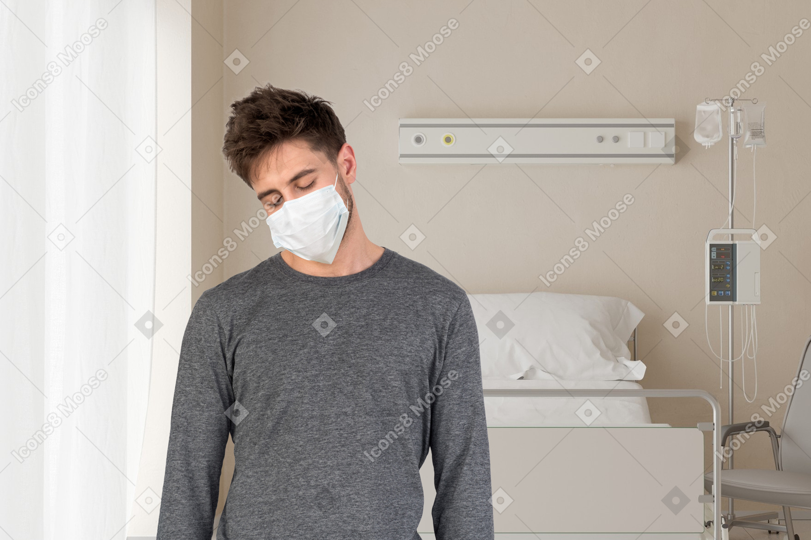 A man wearing a face mask in a hospital room