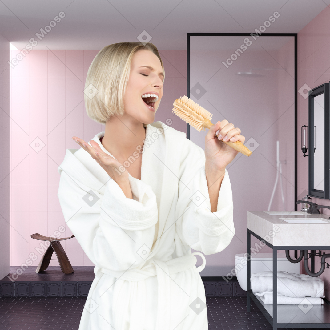 Femme qui chante dans la salle de bain