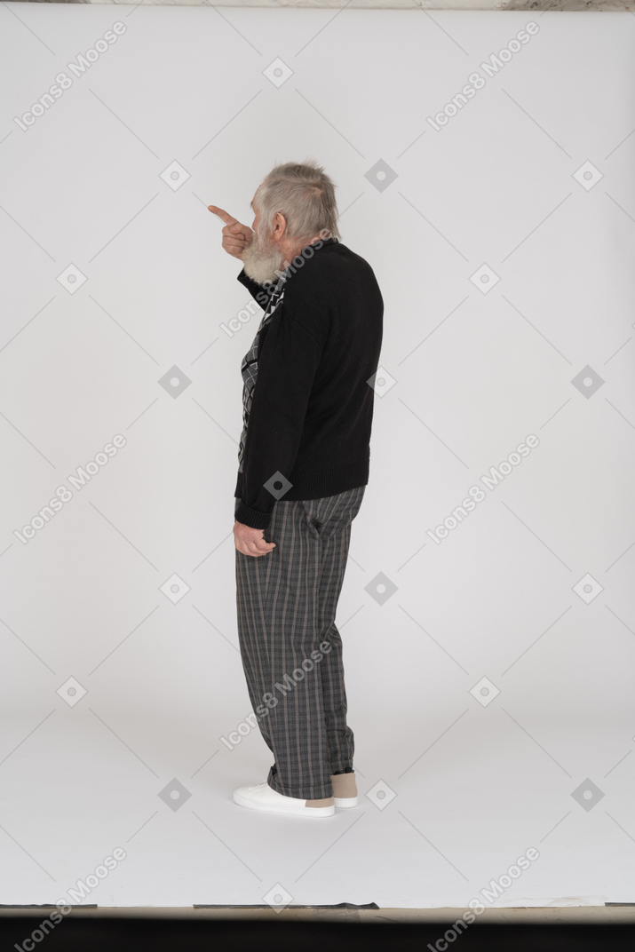 Old man showing index finger