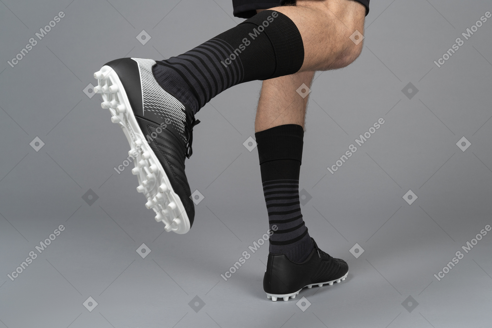 Close-up of a soccer player's legs