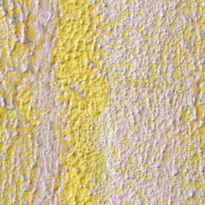 Parede de concreto pintada de amarelo e branco