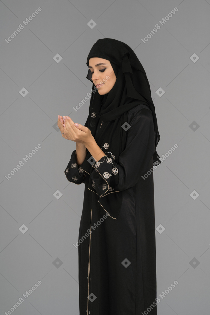 Muslim woman doing dua