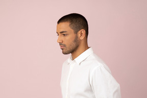 Young handsome man in white shirt