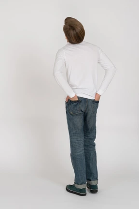 Young man in casual clothes standing