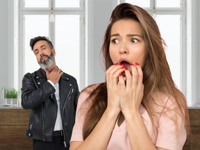 A man standing next to a woman with a surprised look on her face