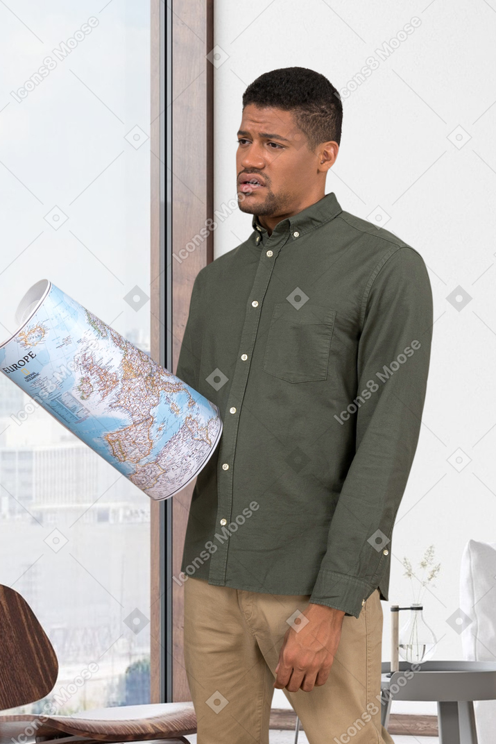 Disappointed man holding a map