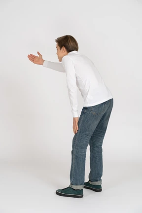 Young man in casual clothes standing