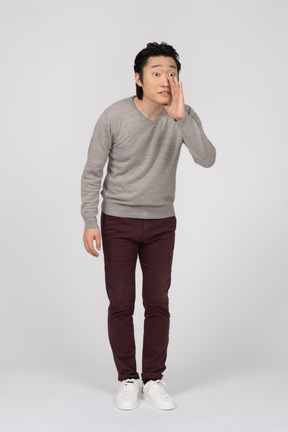 Man in casual clothes posing