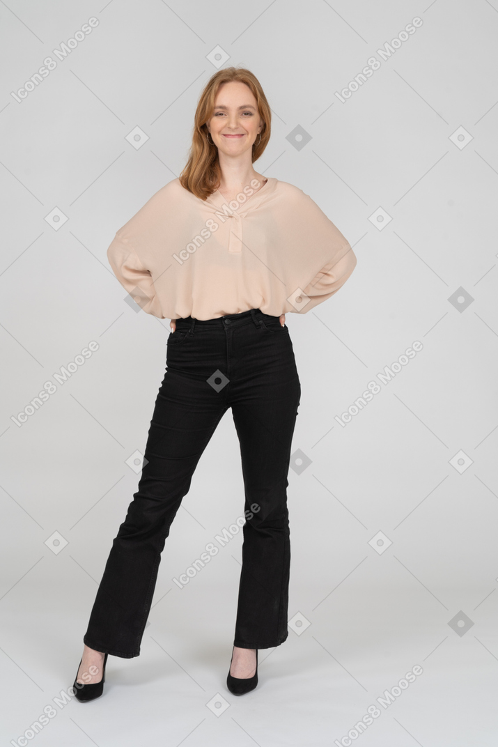 Woman in beautiful blouse standing